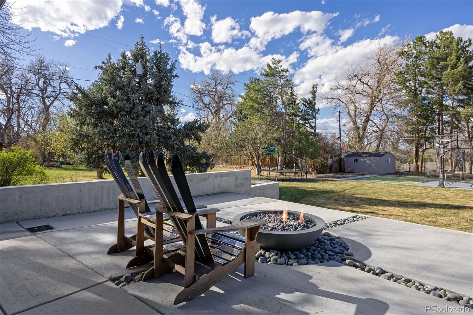 13380 Braun Road Golden, CO 80401 - Photo 41 of 49 a view of a swimming pool and lounge chairs
