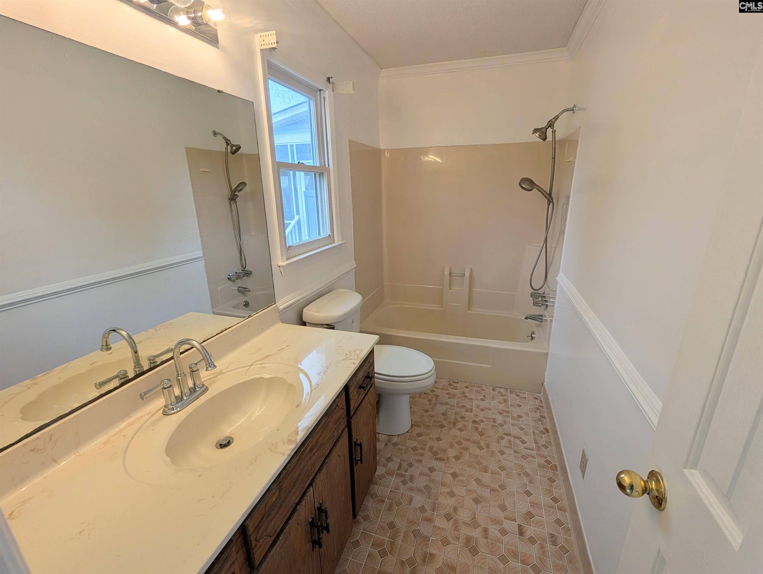 100 Welsh Court Lexington, SC 29073 - Photo 12 of 27 a bathroom with a sink a toilet and shower