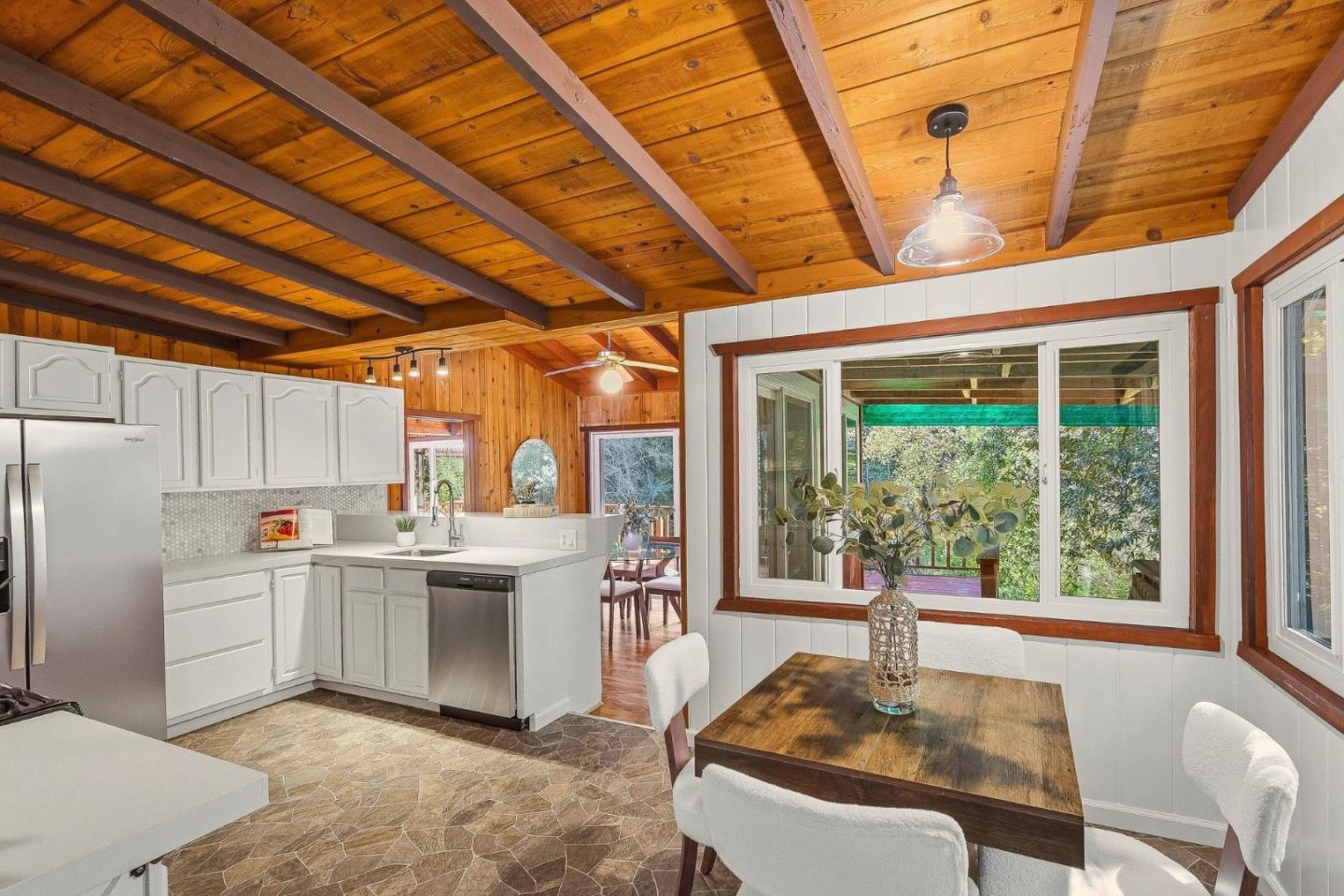 194 Lazy Woods Road Felton, CA 95018 - Photo 20 of 58 a kitchen with sink a stove and chairs