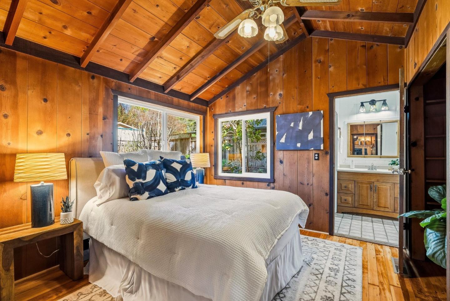 194 Lazy Woods Road Felton, CA 95018 - Photo 31 of 58 a bed room with a bed and a balcony