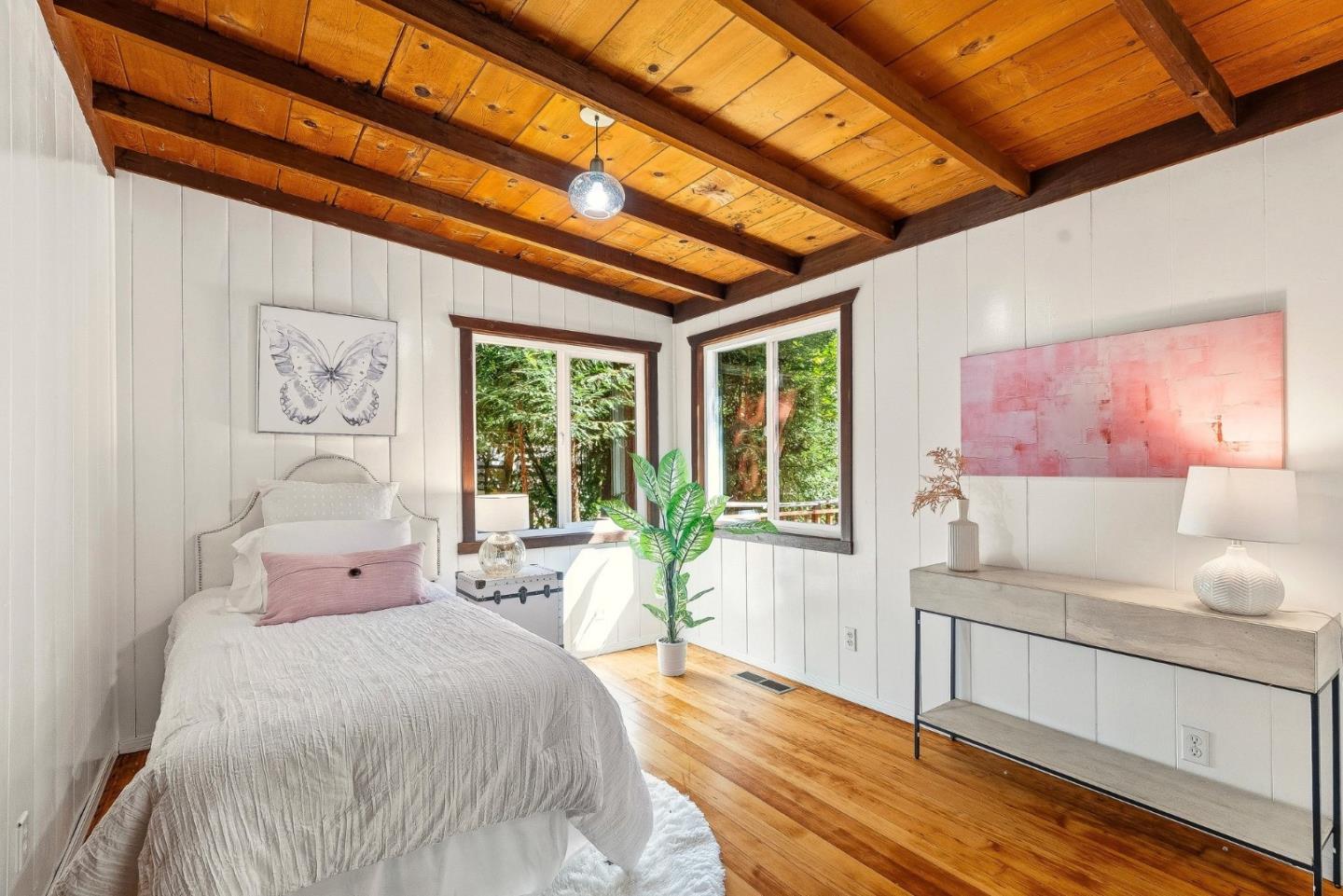 194 Lazy Woods Road Felton, CA 95018 - Photo 35 of 58 a bedroom with furniture and large windows