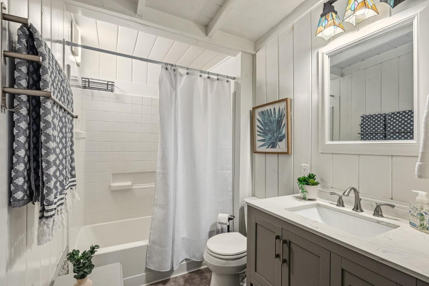 194 Lazy Woods Road Felton, CA 95018 - Photo 38 of 58 a bathroom with a granite countertop sink toilet and shower