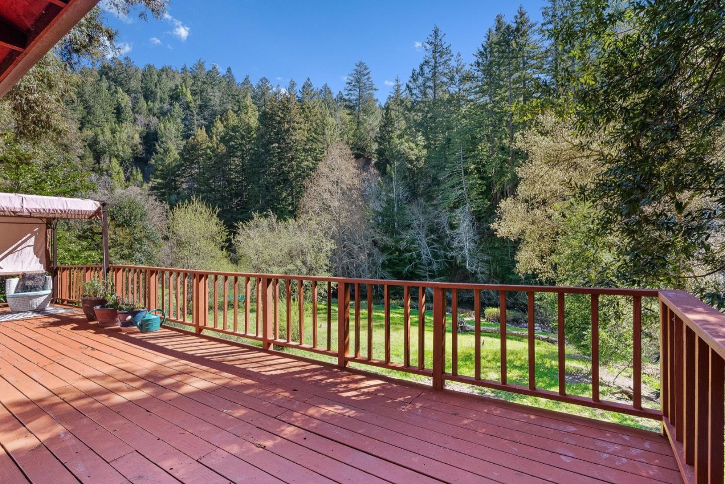 194 Lazy Woods Road Felton, CA 95018 - Photo 9 of 58 a balcony with wooden floor and fence