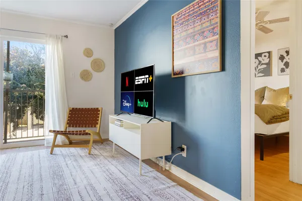 a living room with furniture and a window