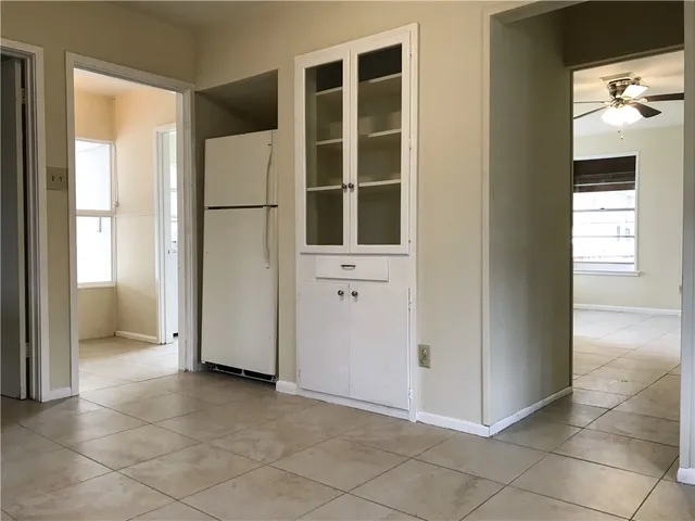 a view of a bathroom with a tub and shower