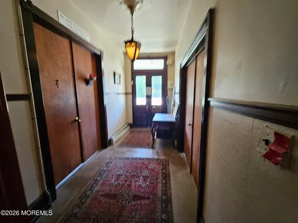 a very nice looking room with a large bed and a large window