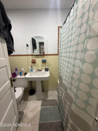 a room with furniture and a flat screen tv