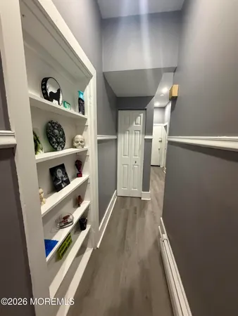 a view of hallway with washer and dryer