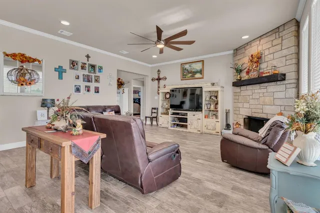 a kitchen with kitchen island granite countertop a table and chairs in it