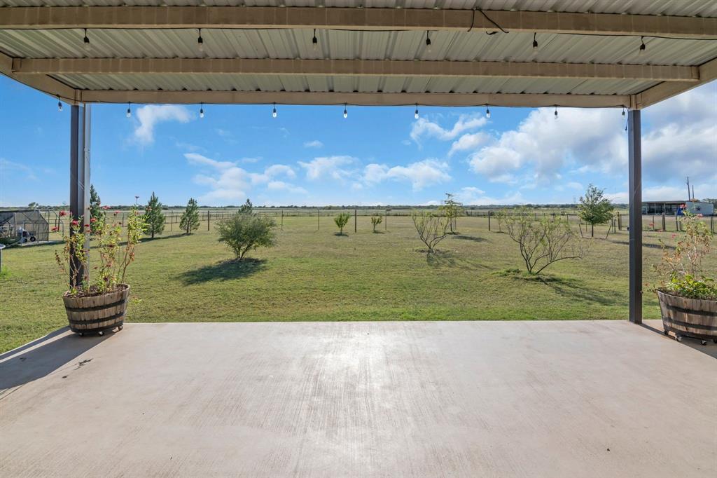 7728 County Road 1205 Rio Vista, TX 76093 - Photo 31 of 31 View of patio / terrace with a view of countryside