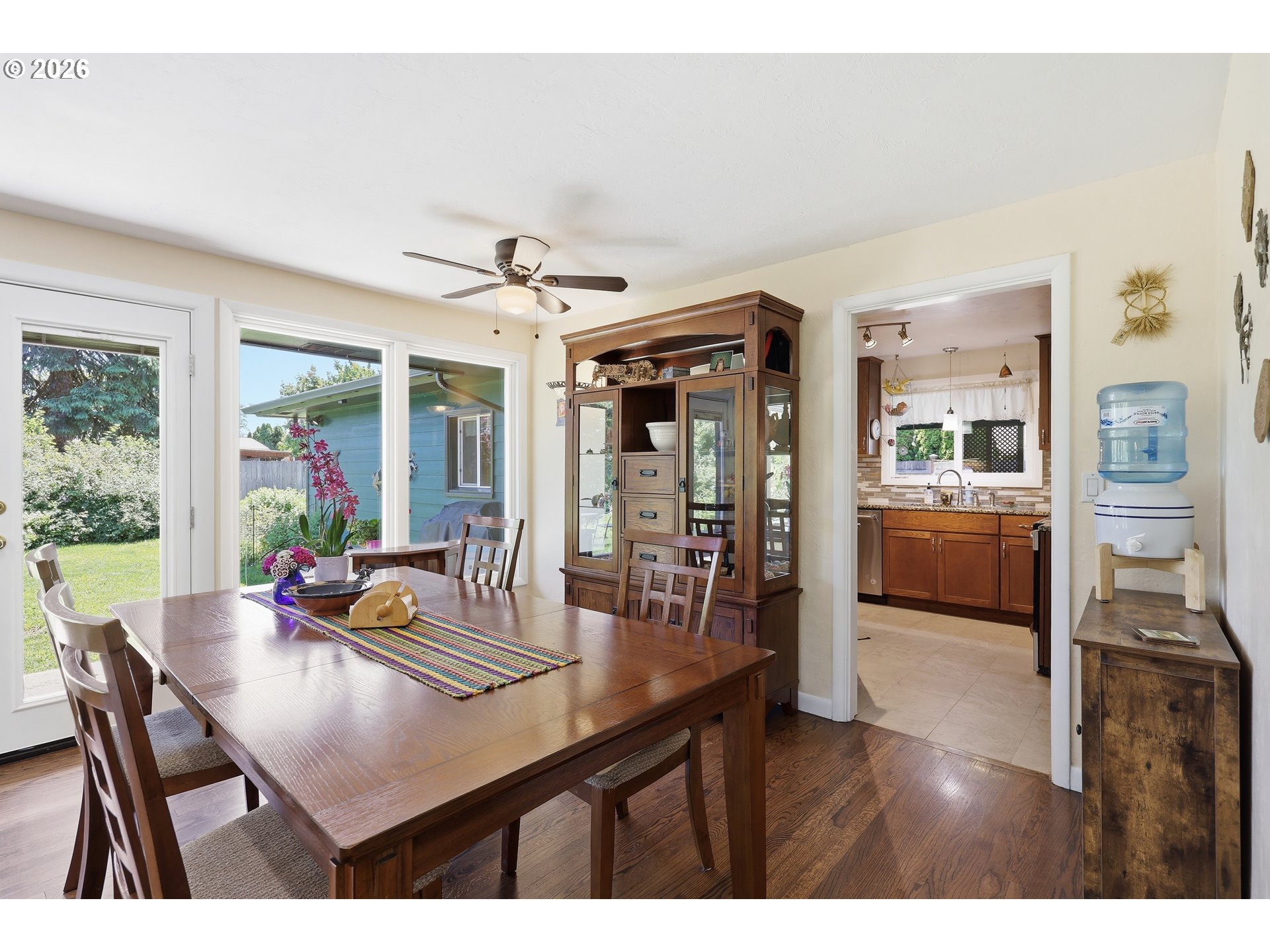65 Greenvale Drive Springfield, OR 97477 - Photo 10 of 42 a view of a dining room with furniture and wooden floor