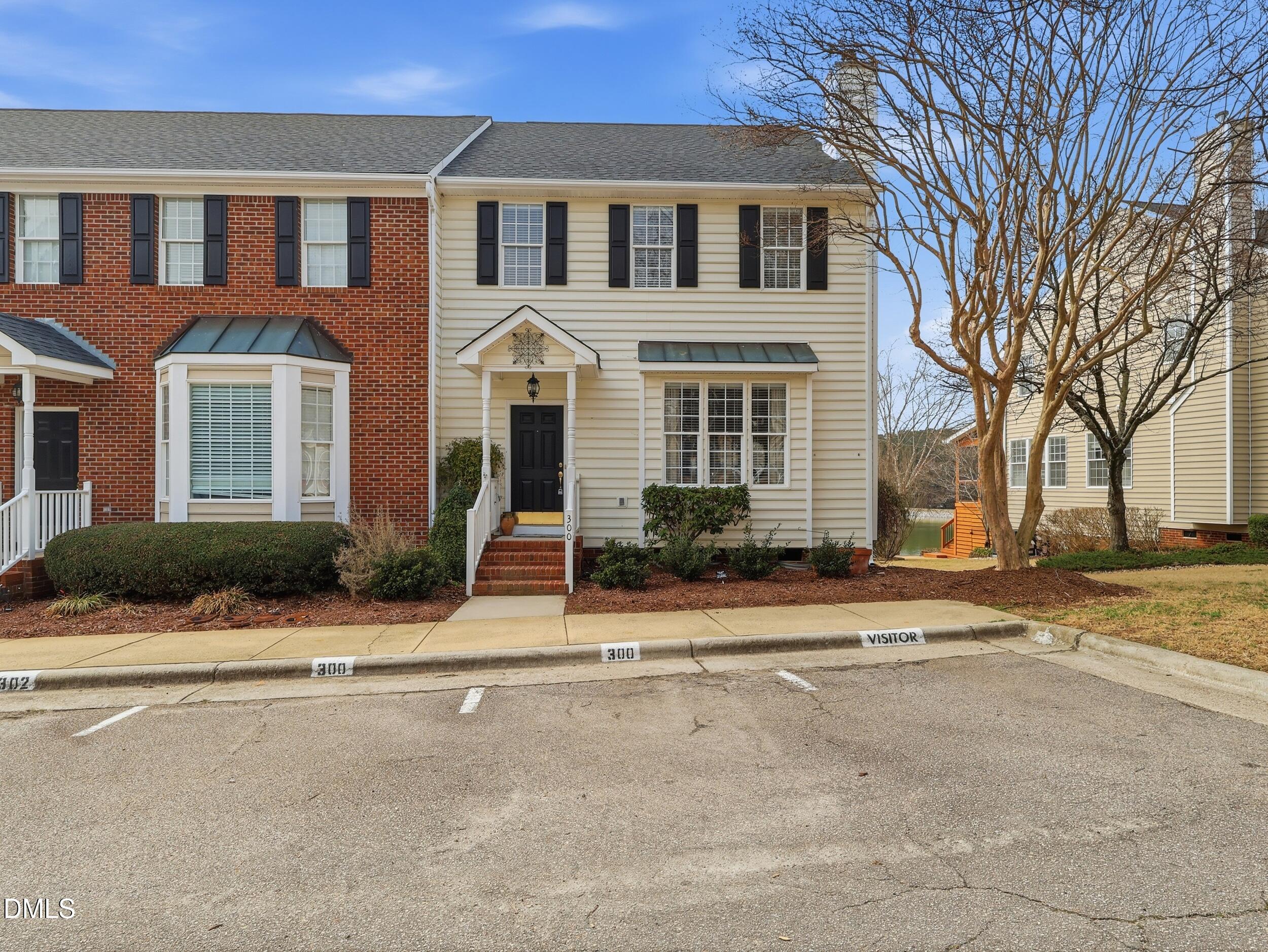 300 Nottinghill Walk Apex, NC 27502 - Photo 1 of 29 front view of a house with a street
