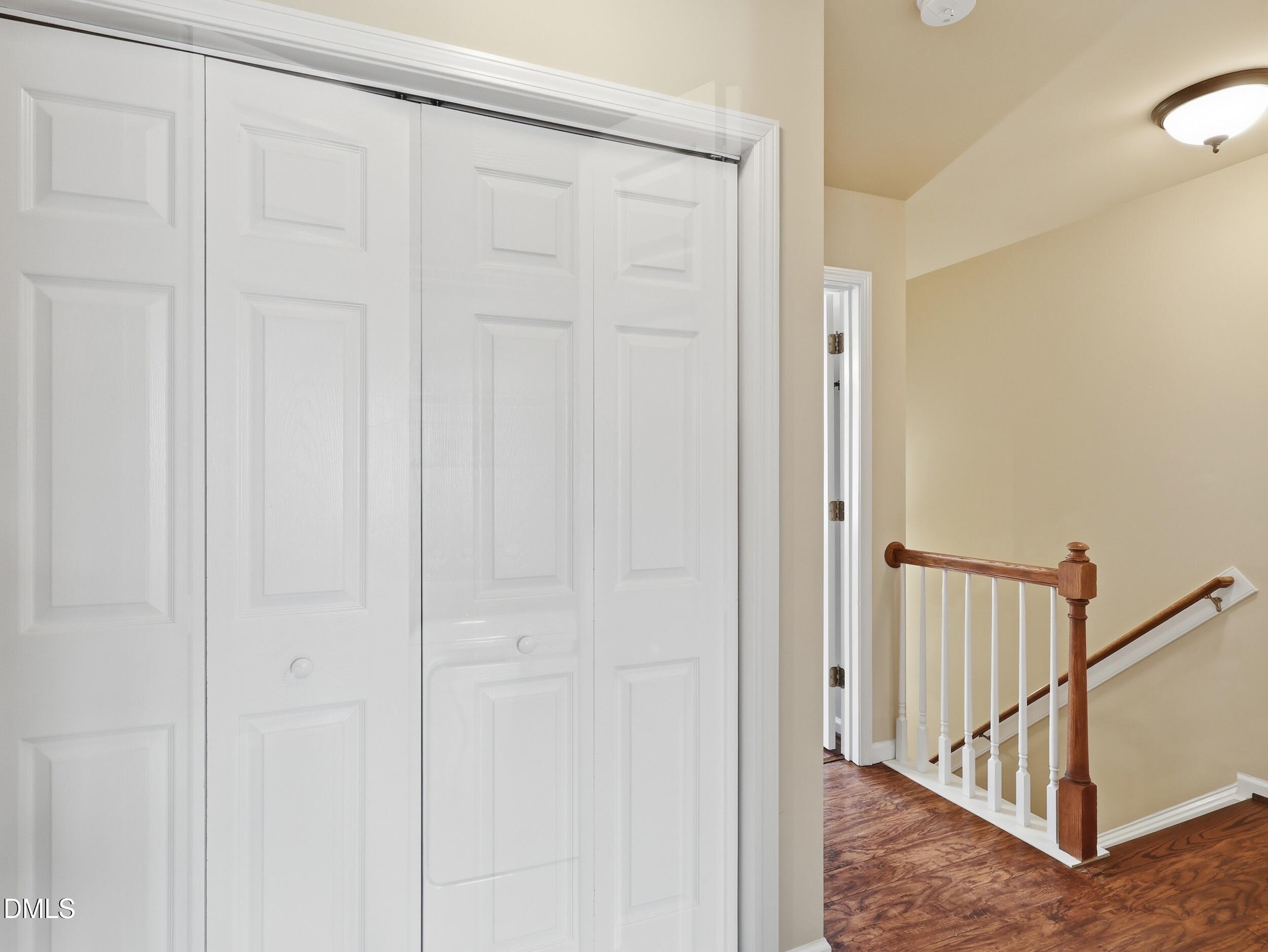300 Nottinghill Walk Apex, NC 27502 - Photo 15 of 29 a view of a hallway with white door