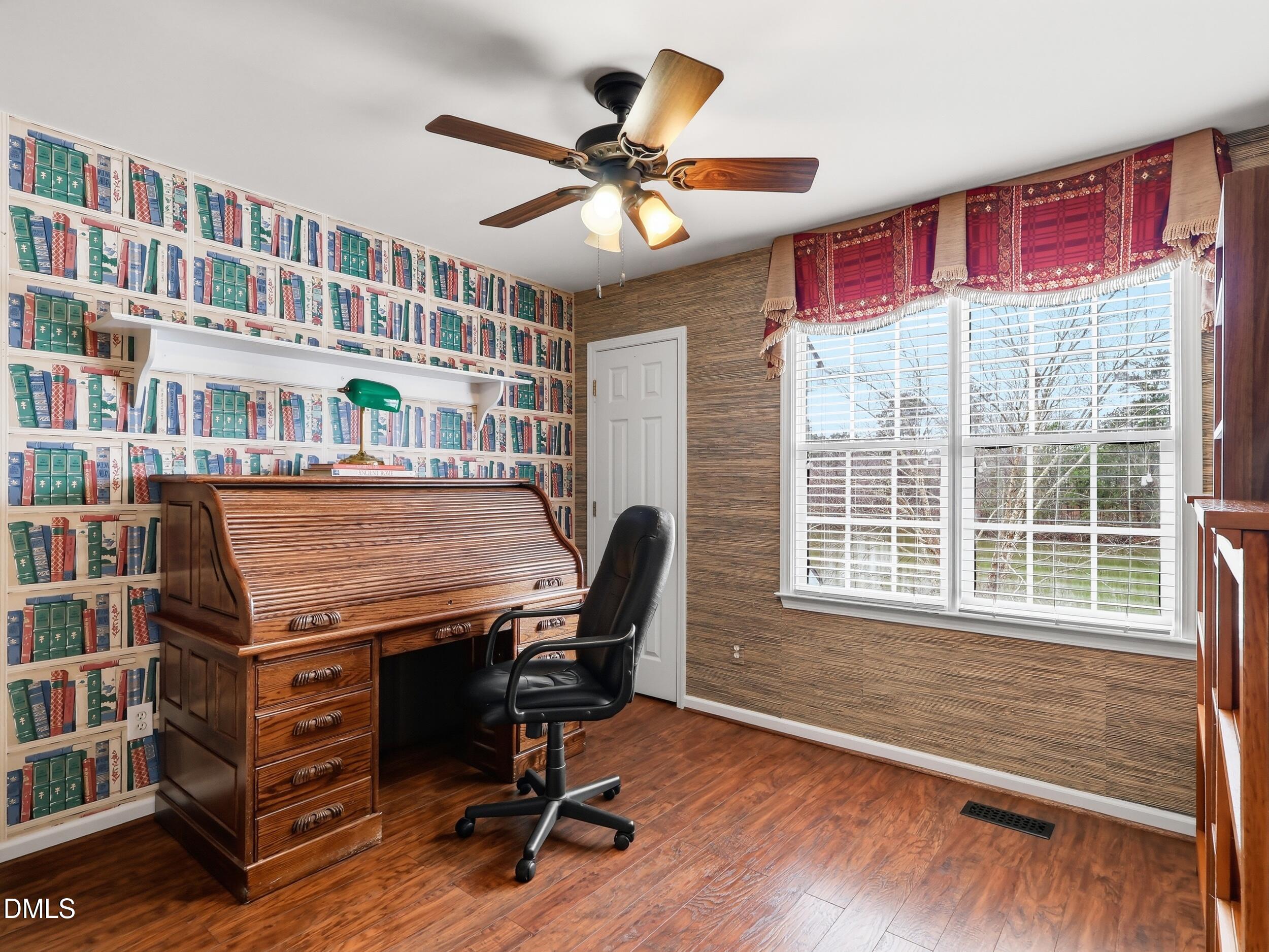 300 Nottinghill Walk Apex, NC 27502 - Photo 21 of 29 a view of a workspace with furniture and a window
