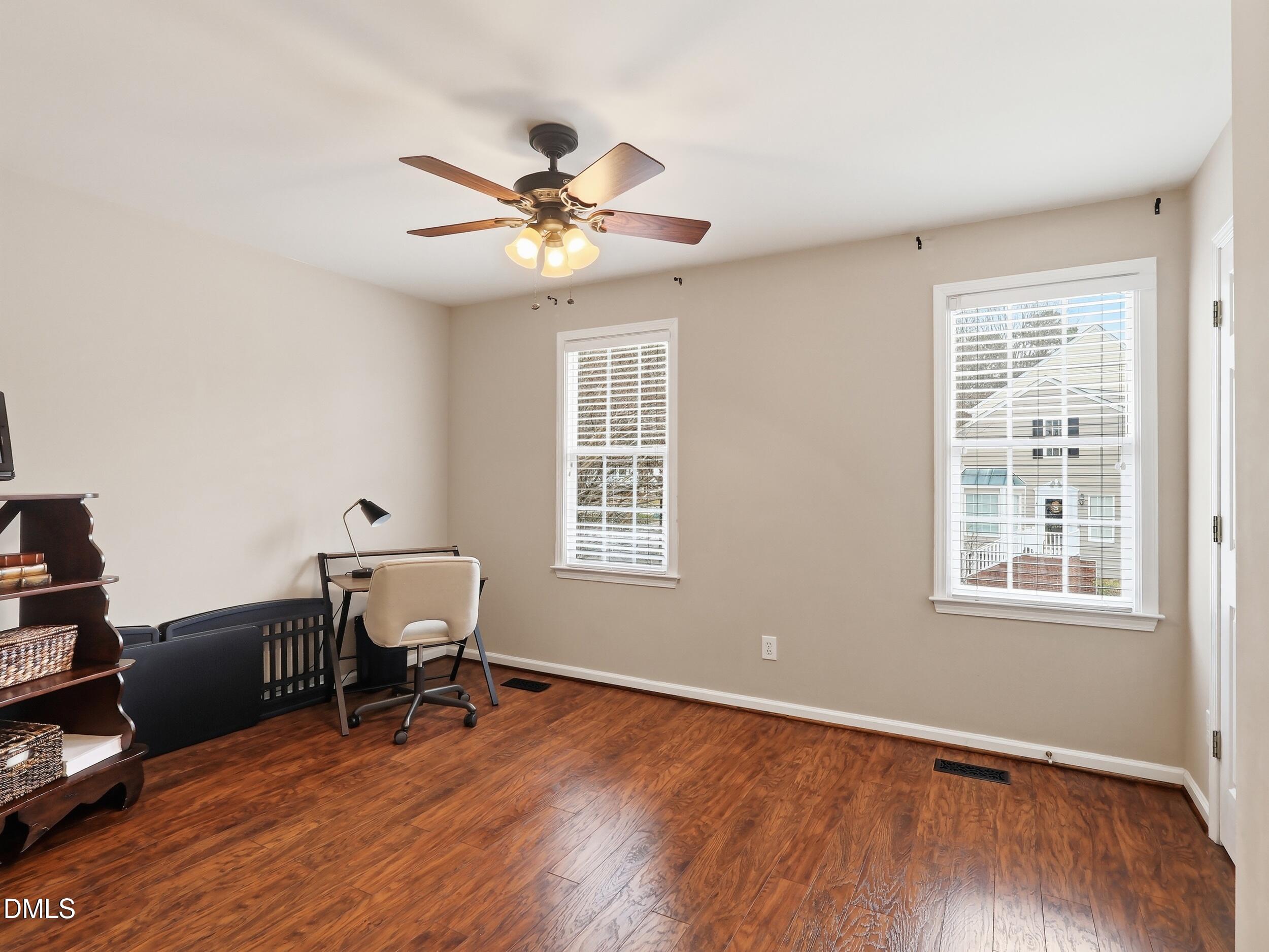 300 Nottinghill Walk Apex, NC 27502 - Photo 22 of 29 a view of a workspace with furniture and a window