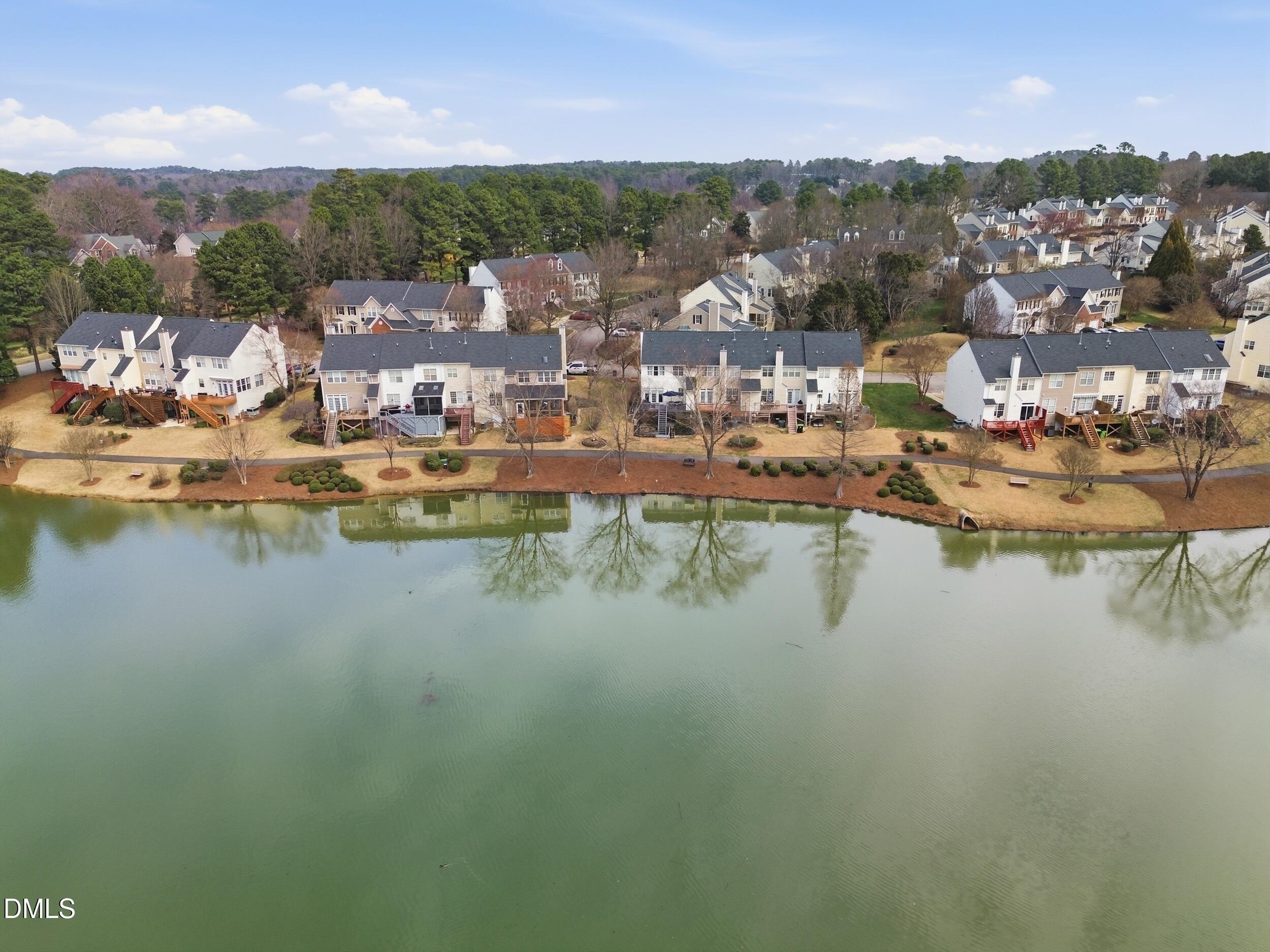 300 Nottinghill Walk Apex, NC 27502 - Photo 3 of 29 a view of a city with lake