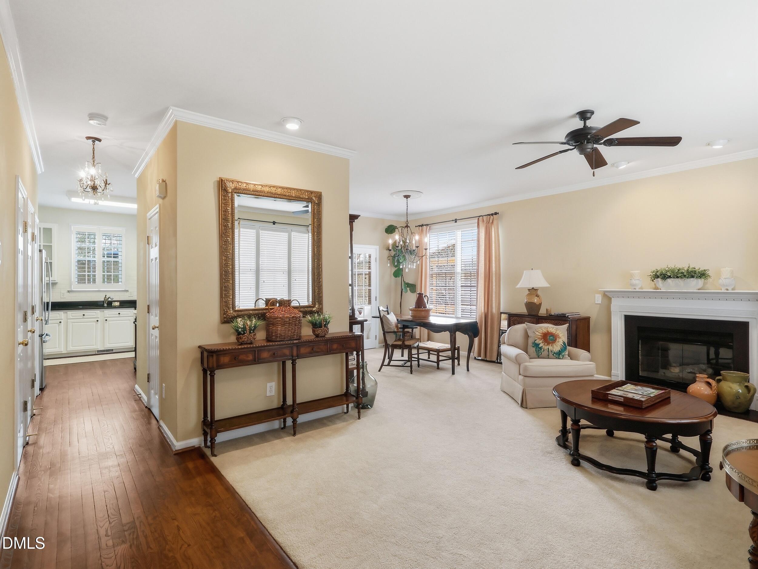 300 Nottinghill Walk Apex, NC 27502 - Photo 4 of 29 a living room with furniture and a fireplace