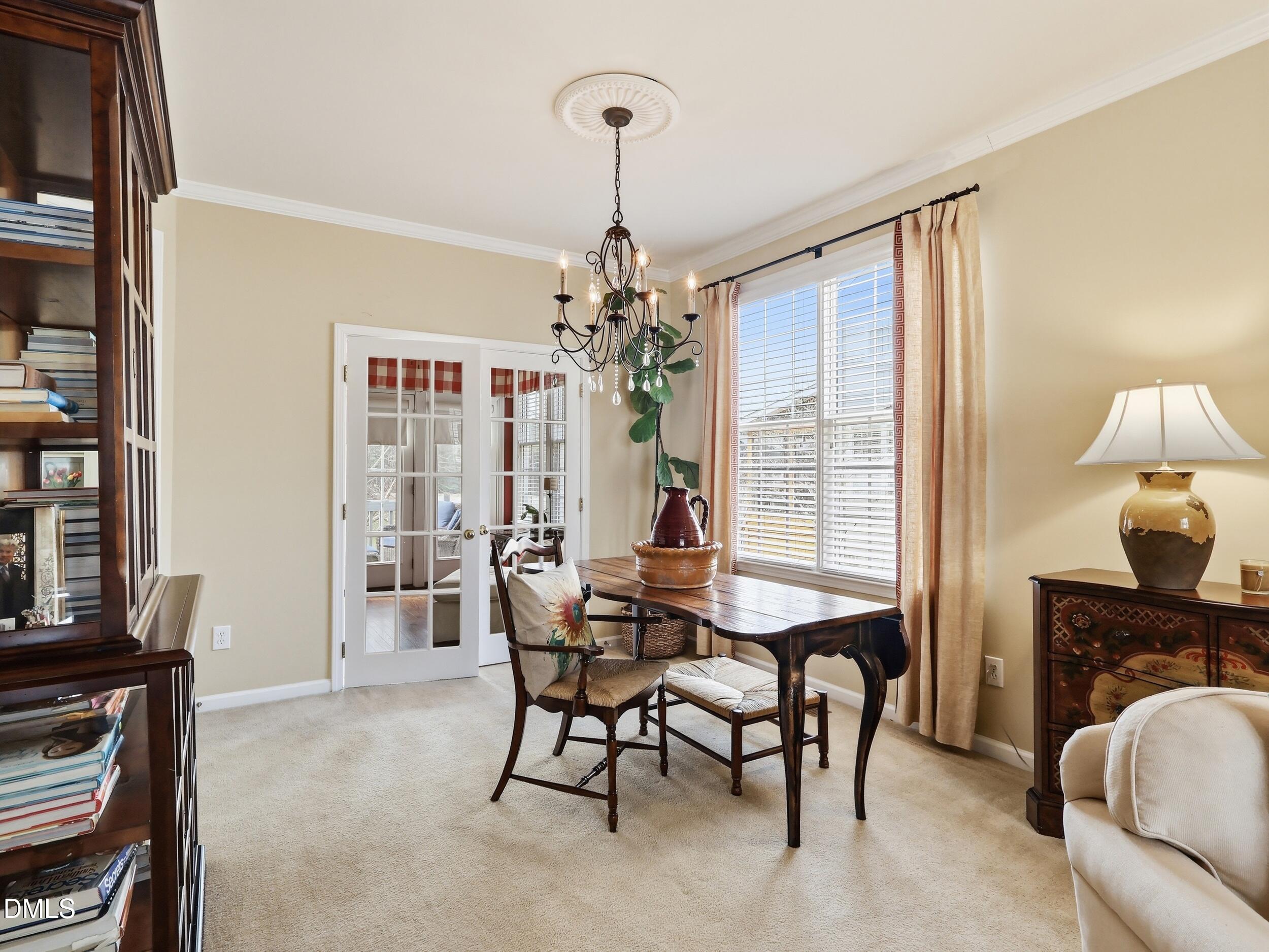 300 Nottinghill Walk Apex, NC 27502 - Photo 6 of 29 a dining room with furniture and window