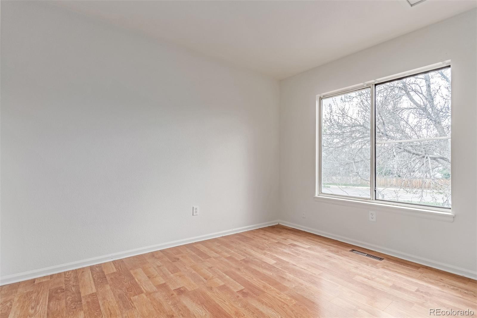 2675 South Deframe Circle Lakewood, CO 80228 - Photo 17 of 28 an empty room with a window