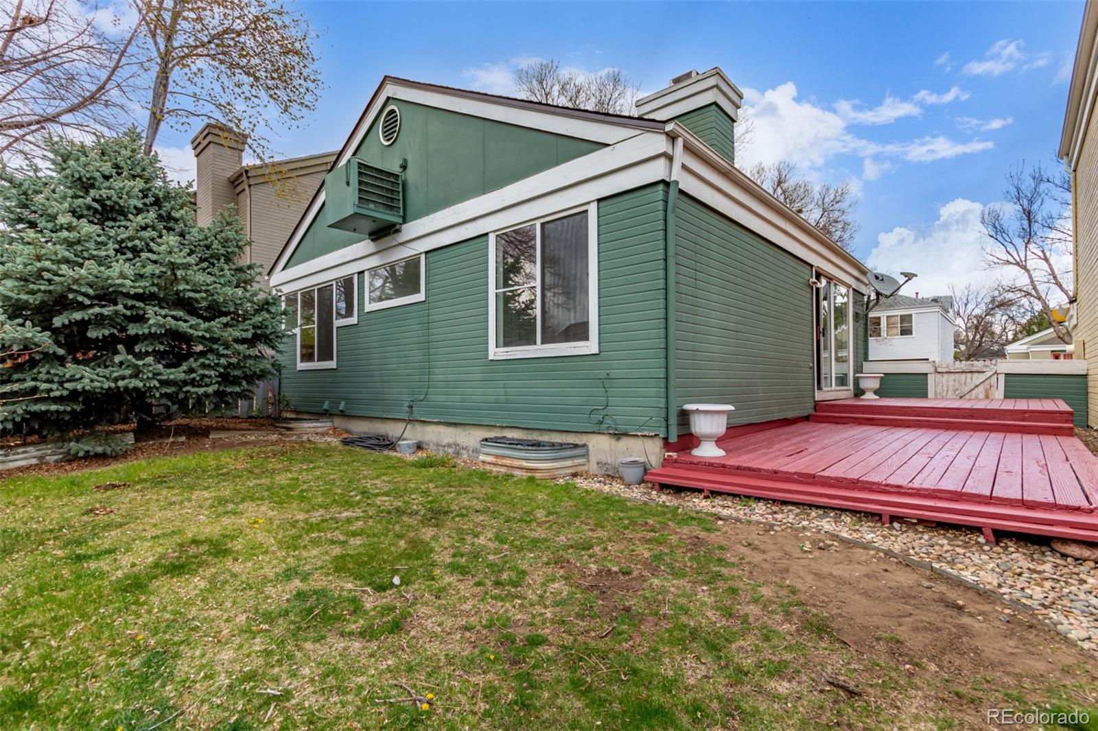 2675 South Deframe Circle Lakewood, CO 80228 - Photo 26 of 28 a view of a house with a yard