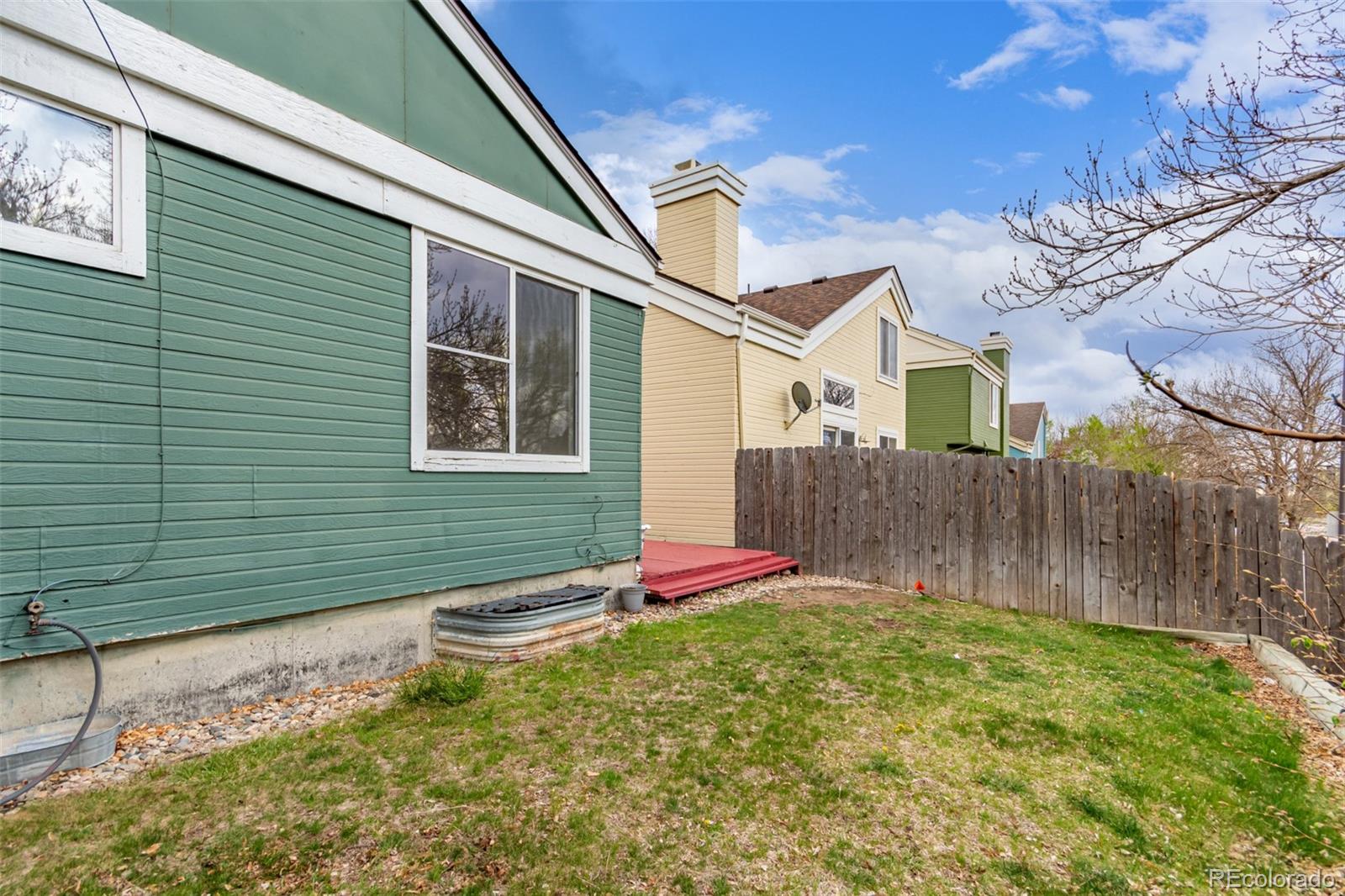 2675 South Deframe Circle Lakewood, CO 80228 - Photo 28 of 28 a view of a backyard with a small cabin