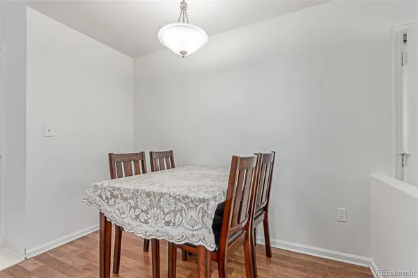 a view of a dining room with furniture