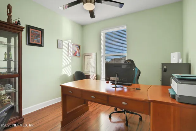 a room with furniture and wooden floor