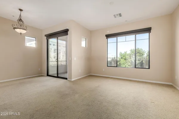 an empty room with windows