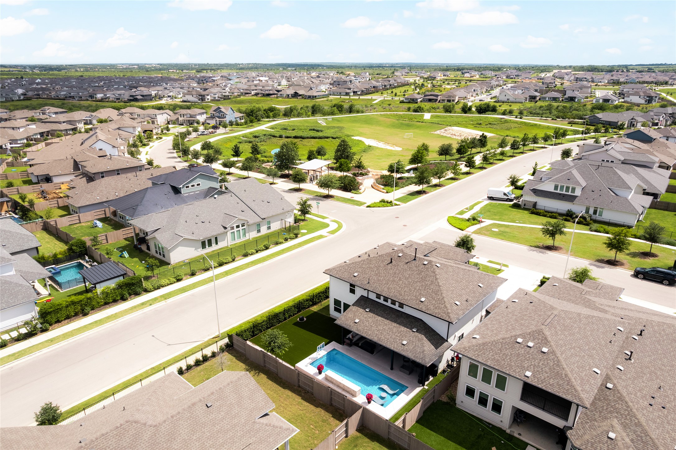 7917 Edmondson Bend Austin, TX 78744 - Photo 23 of 24 Newly constructed residence featuring a private swimming pool, covered patio, and fenced backyard