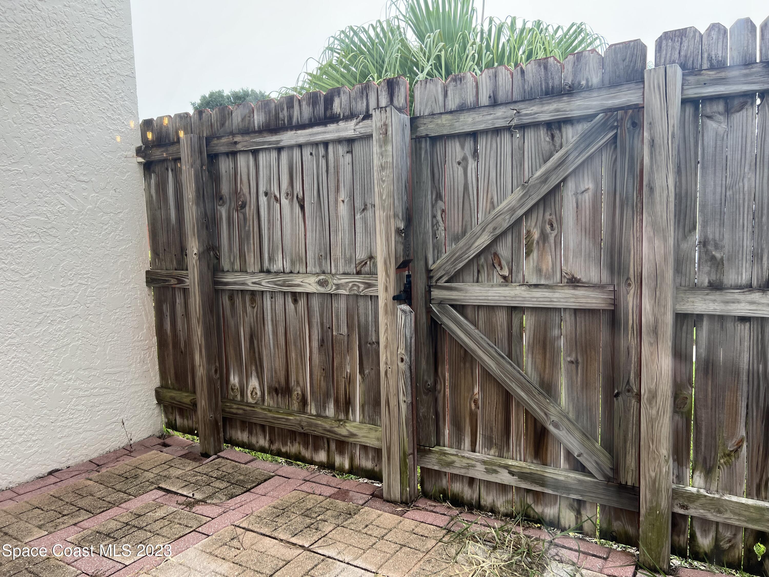 756 Ridge Club Drive, Unit 61 Melbourne, FL 32934 - Photo 24 of 29 a view of wooden deck