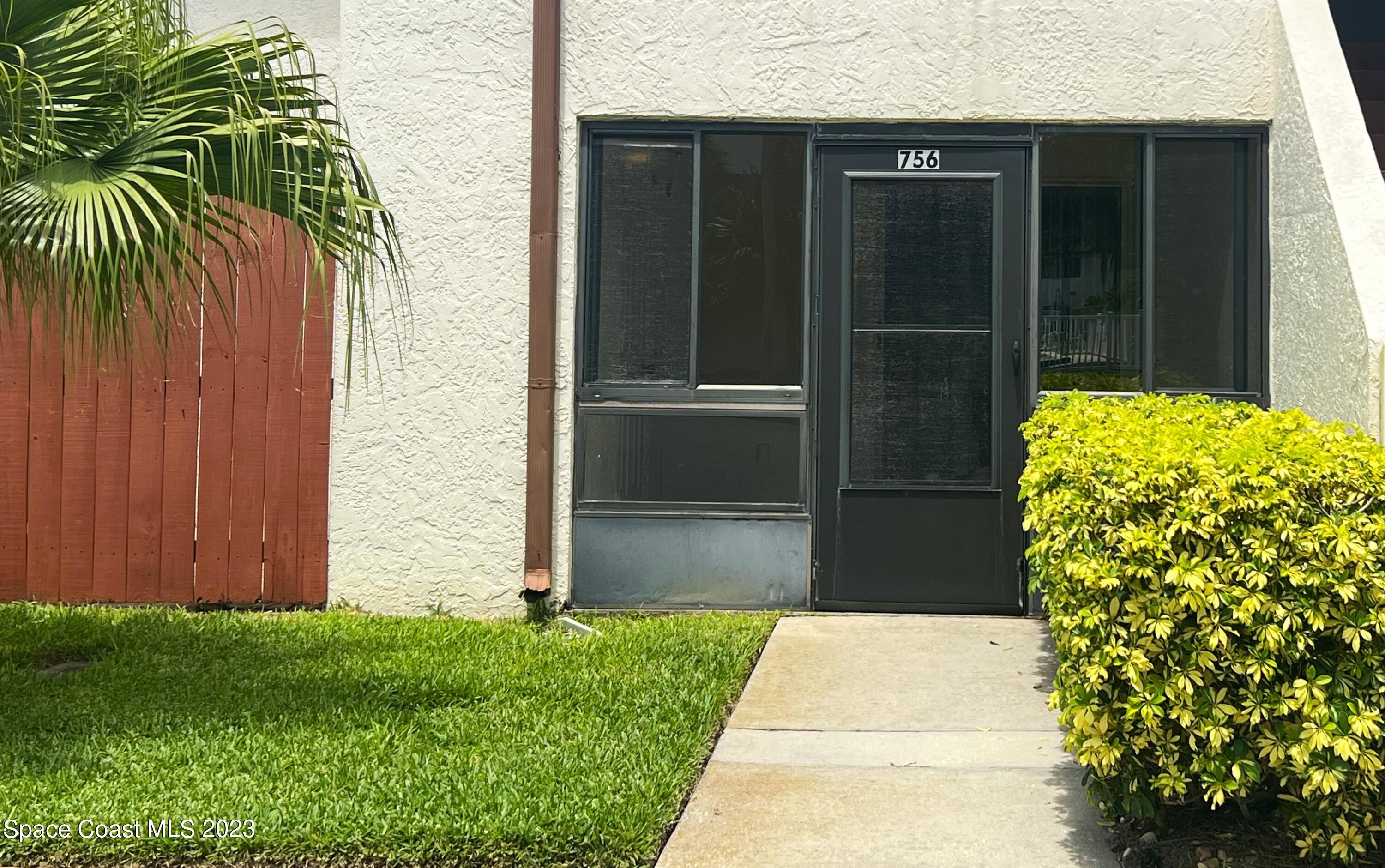 756 Ridge Club Drive, Unit 61 Melbourne, FL 32934 - Photo 3 of 29 a view of outdoor space and yard