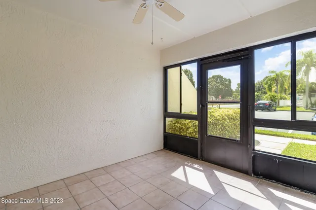 a view of an empty room and window