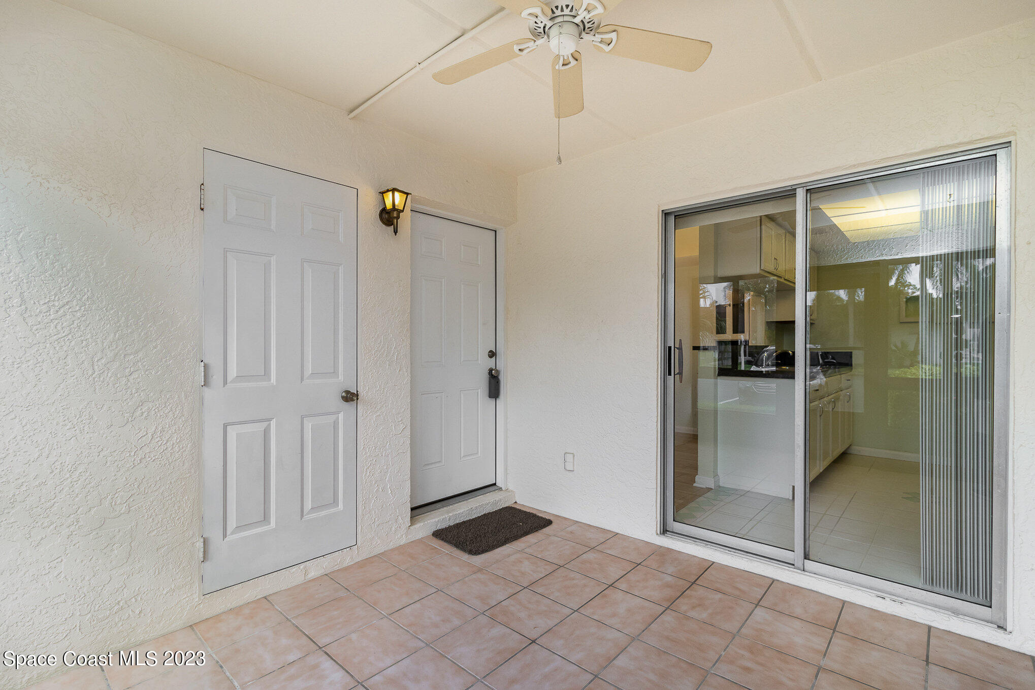 756 Ridge Club Drive, Unit 61 Melbourne, FL 32934 - Photo 5 of 29 a view of a bathroom with a shower and a sink