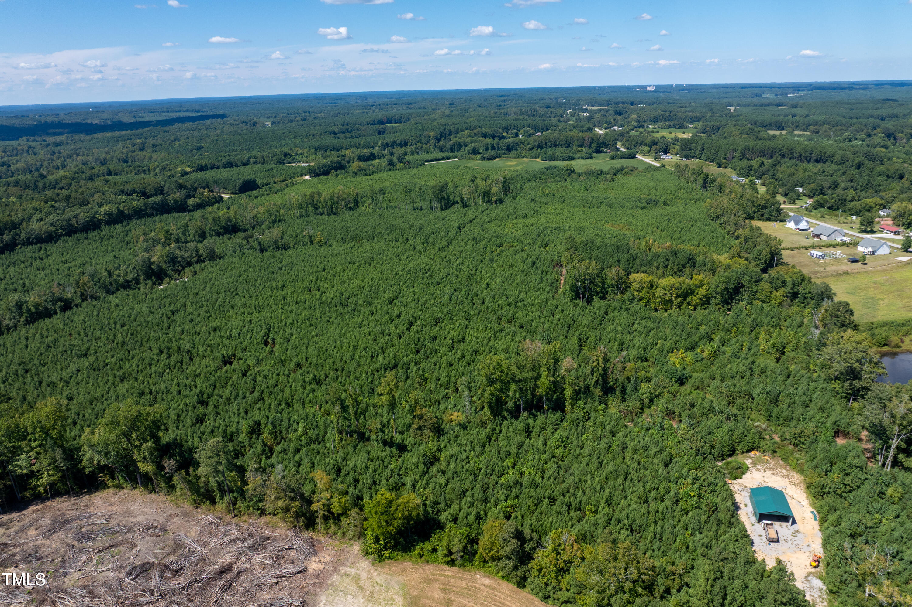 2 Julie McKnight Road Kittrell, NC 27544 - Photo 25 of 34 a view of a green field near a forest