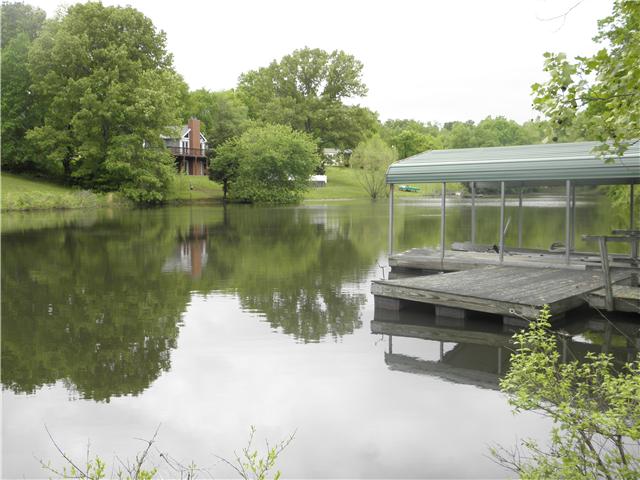 603 Brown Road Bon Aqua, TN 37025 - Photo 3 of 20 Two boat docks and a manufactured home that was new in 2000 w/3BR, 2BA, Greatroom, kitchen & dining area, laundry room and walk-in pantry. Double decks overlook the lake. Fenced area for a garden and strawberry plants already producing.