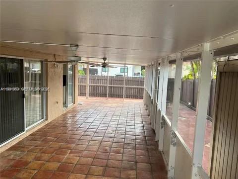 14218 Southwest 176th Terrace Miami, FL 33177 - Photo 15 of 19 a bathroom with a glass door shower and a sink