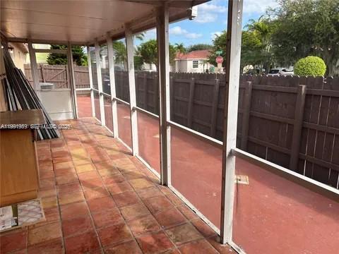 14218 Southwest 176th Terrace Miami, FL 33177 - Photo 17 of 19 a view of a porch