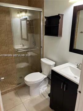 14218 Southwest 176th Terrace Miami, FL 33177 - Photo 5 of 19 a bathroom with a sink toilet and shower
