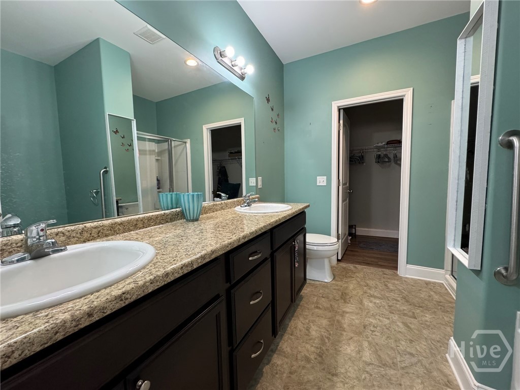 576 Gov Treutlen Circle Pooler, GA 31322 - Photo 10 of 22 Primary Bathroom