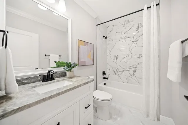 $990,000 | 211 Dolphin Point, Unit 202, Clearwater Beach, FL 33767