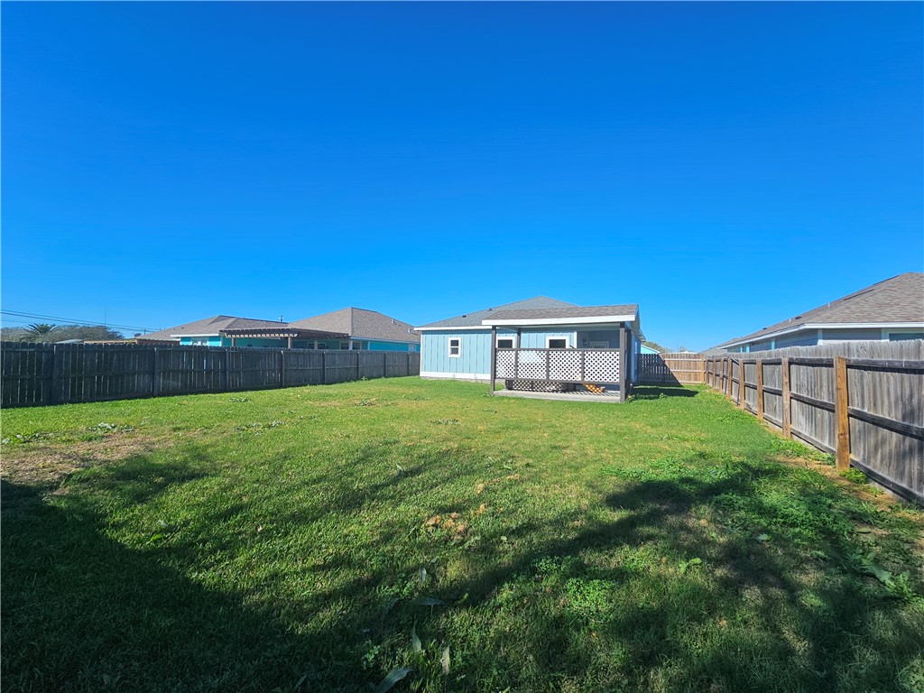 2366 Scott Circle Ingleside, TX 78362 - Photo 23 of 26 a view of a house with backyard and a hammock