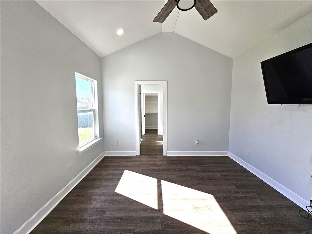 2366 Scott Circle Ingleside, TX 78362 - Photo 3 of 26 a view of an empty room with wooden floor and a window