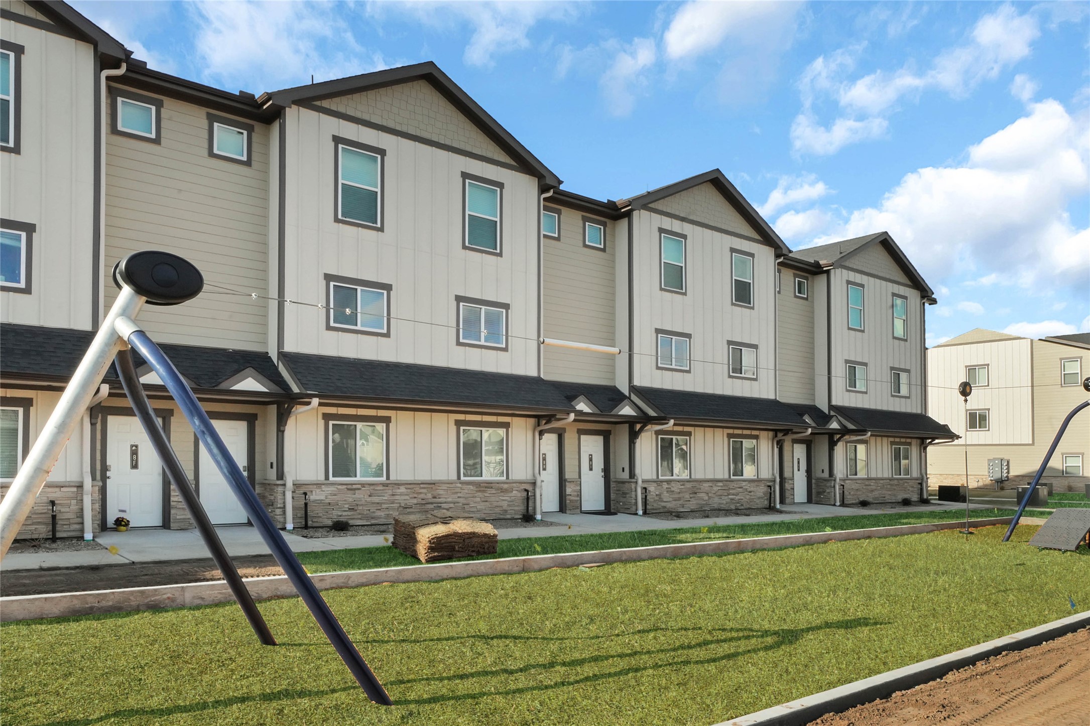12603 Telge Road, Unit 22EF Cypress, TX 77429 - Photo 18 of 20 a front view of a house with a yard