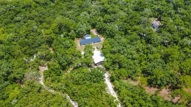 a view of a house in a yard