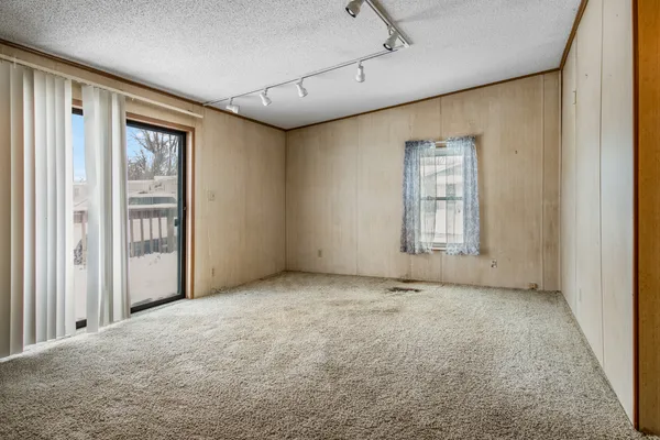 an empty room with windows