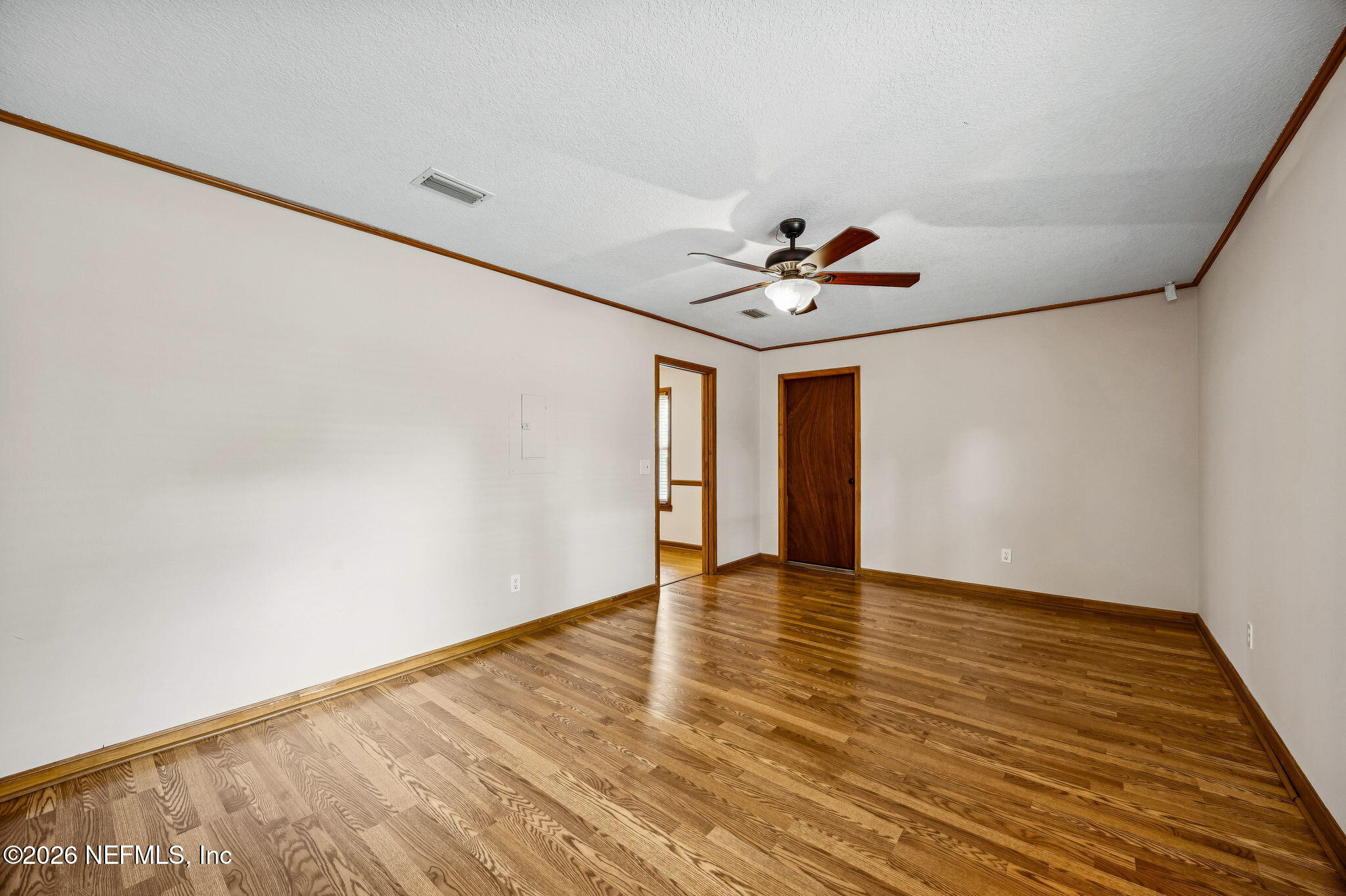 1888 Clemson Road Jacksonville, FL 32217 - Photo 10 of 41 a view of an empty room with a window