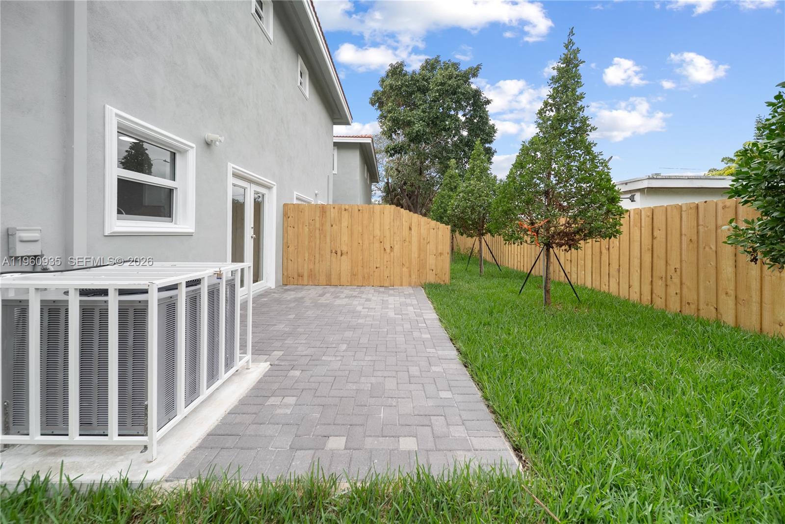 529 Northwest 56th Street Miami, FL 33127 - Photo 16 of 66 a view of a backyard with a garden