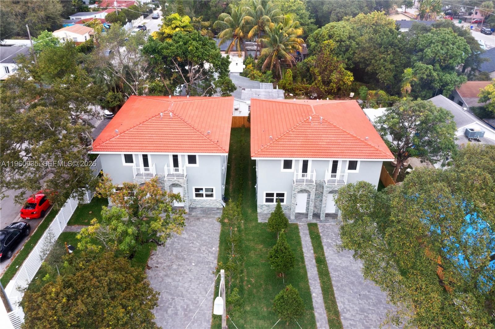 529 Northwest 56th Street Miami, FL 33127 - Photo 2 of 66 a front view of a house with a yard