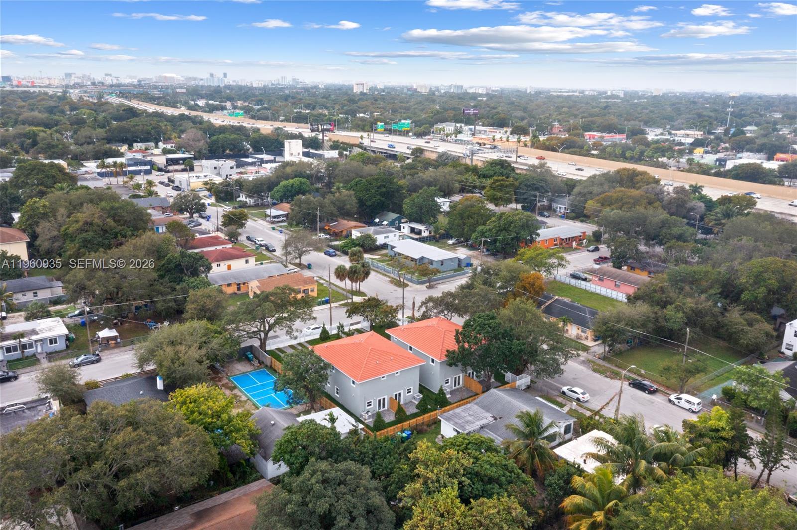 529 Northwest 56th Street Miami, FL 33127 - Photo 3 of 66 an aerial view of residential houses with outdoor space