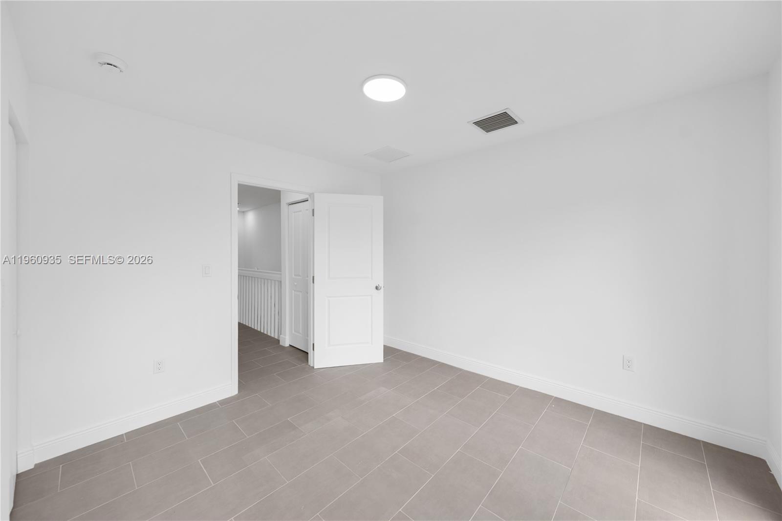 529 Northwest 56th Street Miami, FL 33127 - Photo 44 of 66 a view of an empty room